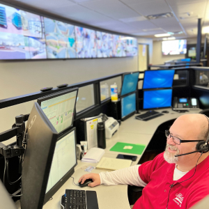 Greg working in Holmes Security Systems central monitoring station